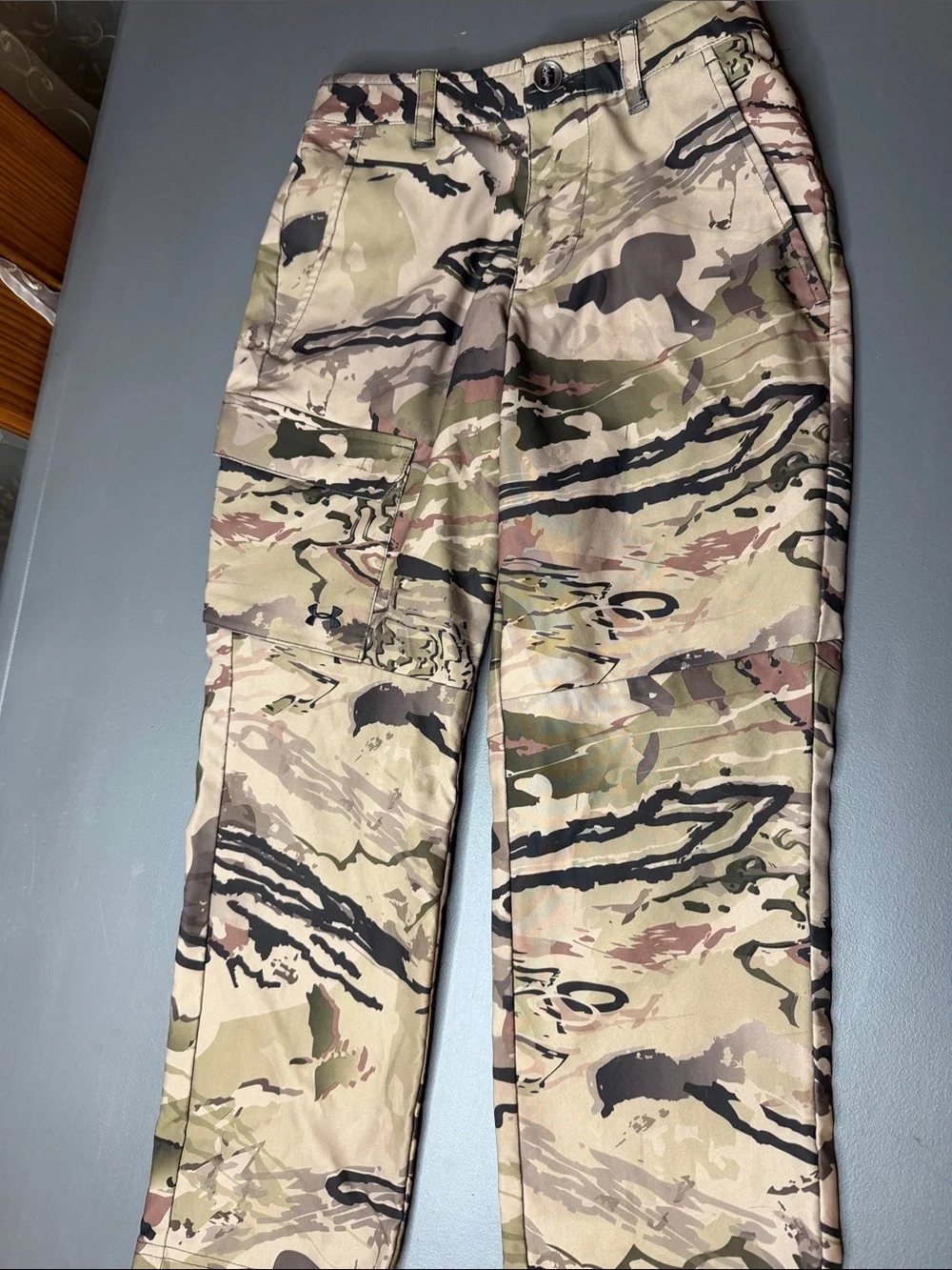 Kid’s Under Armour Storm Camo pants. Size: 10